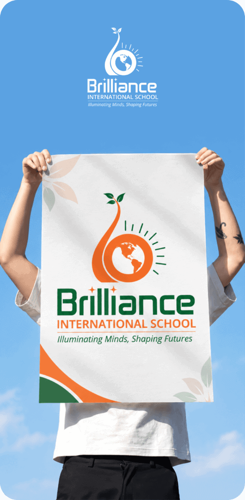 Brilliance International School logo on a banner held by a person.